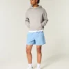 Polvipituiset hybridiaktiivishortsit Polvipituiset hybridiaktiivishortsit