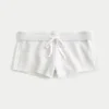 Sivuraitainen fleece-minishortsit Sivuraitainen fleece-minishortsit
