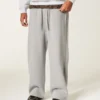 Takatasku Los Angeles -kuvio Superbaggy-verkkarihousut Takatasku Los Angeles -kuvio Superbaggy-verkkarihousut