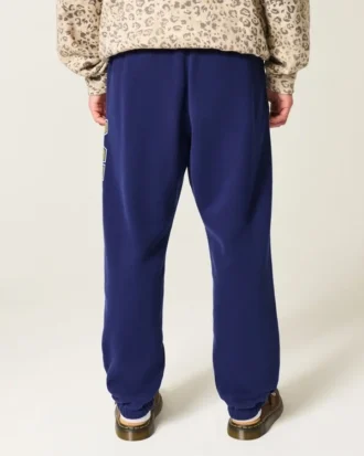 University of Michigan Wolverines -grafiikka, väljät fleece-joggerit University of Michigan Wolverines -grafiikka, väljät fleece-joggerit