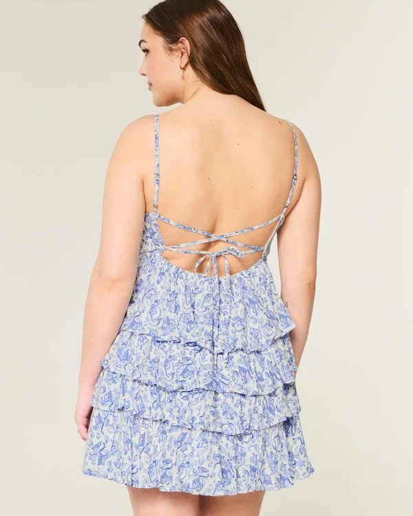 V-kaula-aukkoinen röyhelöinen babydoll-minimekko V-kaula-aukkoinen röyhelöinen babydoll-minimekko