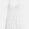 V-kaula-aukkoinen röyhelöinen babydoll-minimekko V-kaula-aukkoinen röyhelöinen babydoll-minimekko