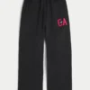 Vault Release -logolla varustetut baggy-housut Vault Release -logolla varustetut baggy-housut