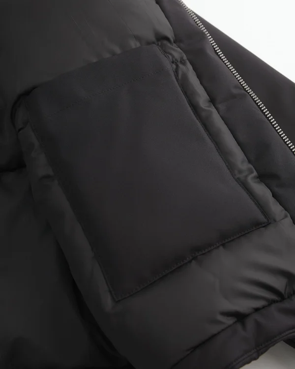 Vetoketjullinen untuvatakki Vetoketjullinen untuvatakki